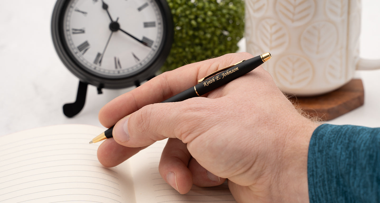 A group of pens on a white background.