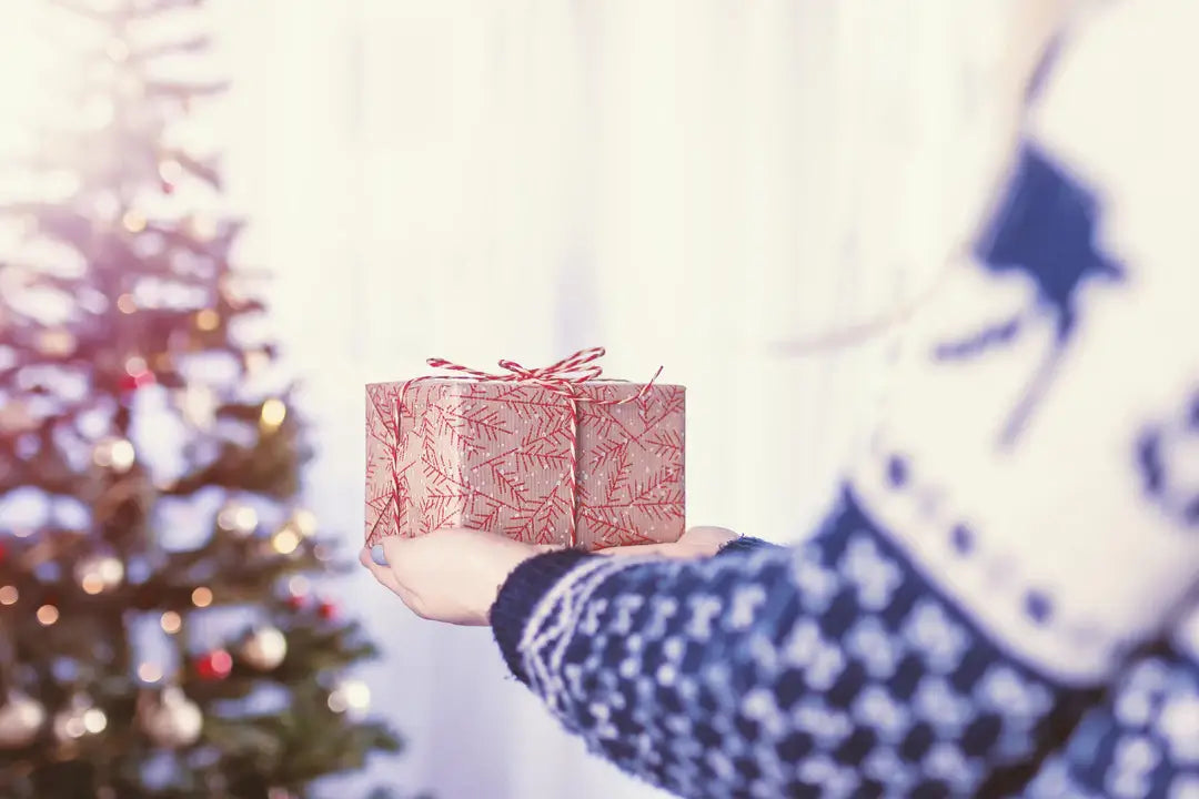 family celebrating christmas with christmas pen