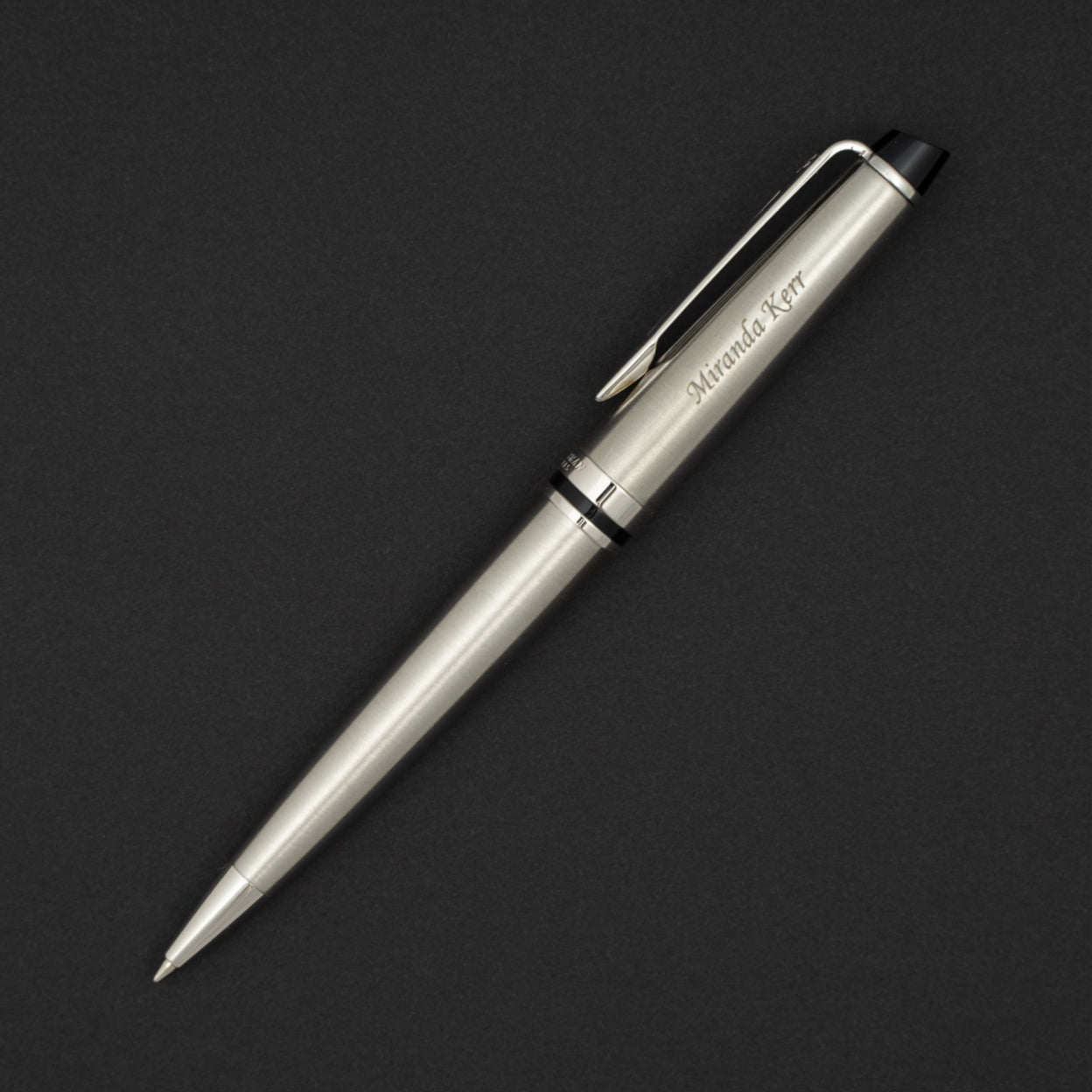 Engraved Expert Chrome Trim Ballpoint displayed on black table
