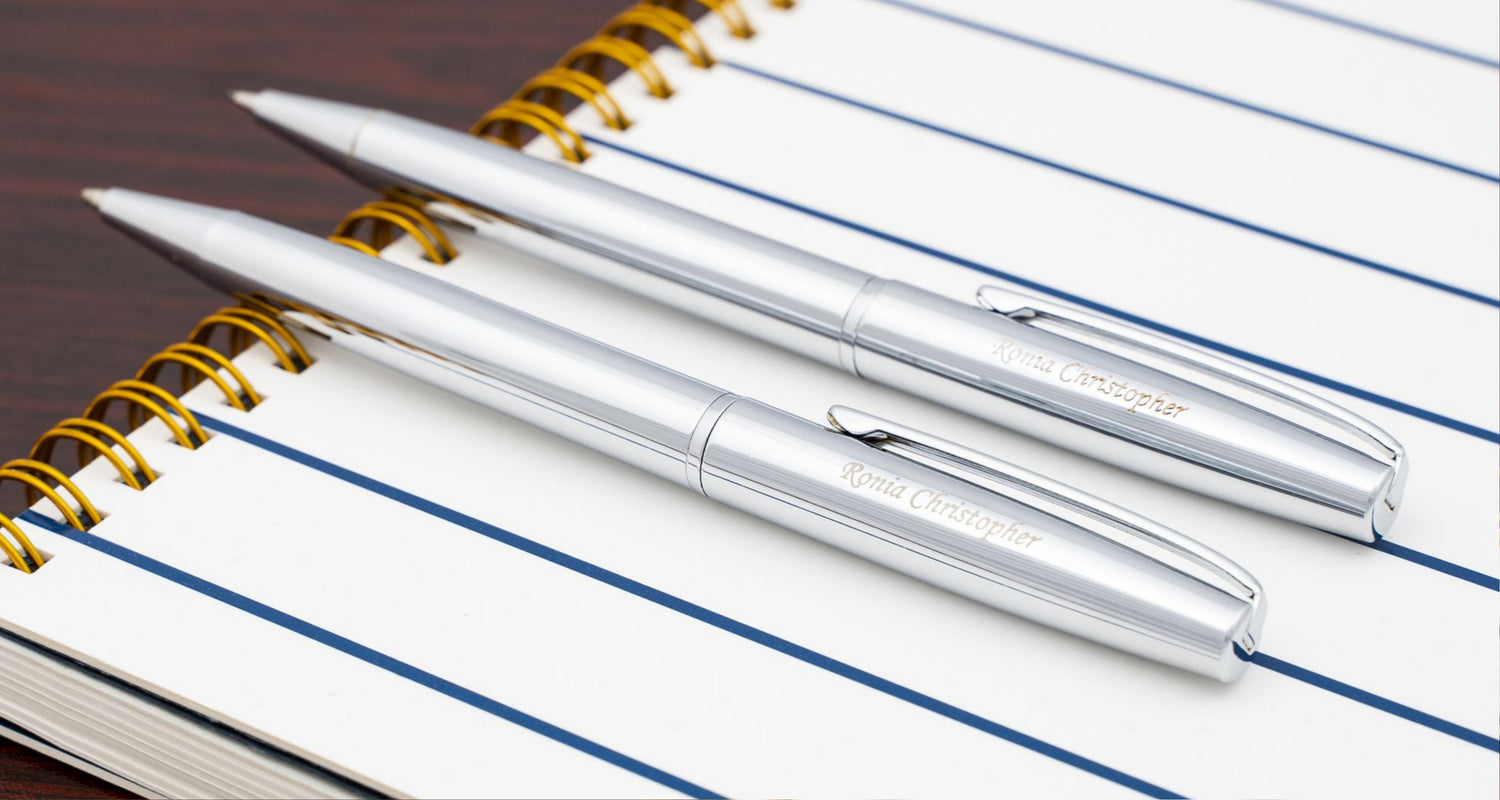 Engraved Richmond Chrome Set placed on top of notebook